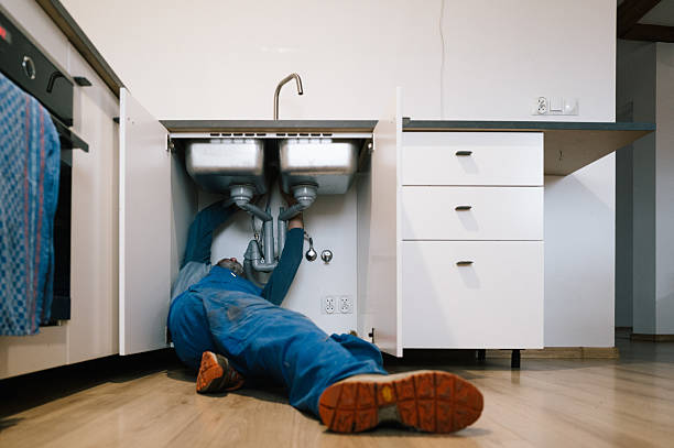 Professional Drain Cleaning technician working in Mansfield Center, MA